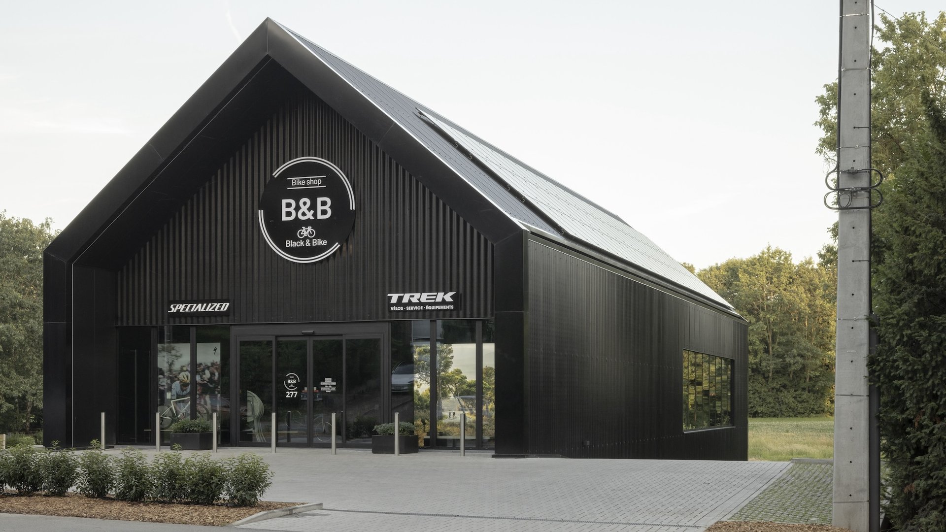 Construction magasin vélo Wavre par RG architectes - Black&Bike