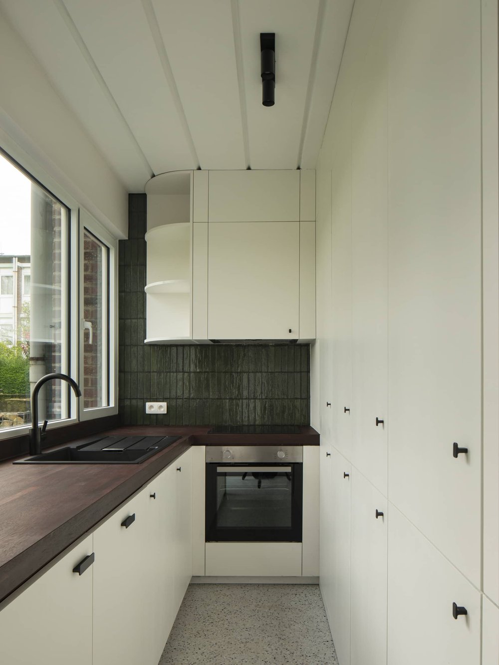 RG architectes cuisine carrelage vert Kraainem